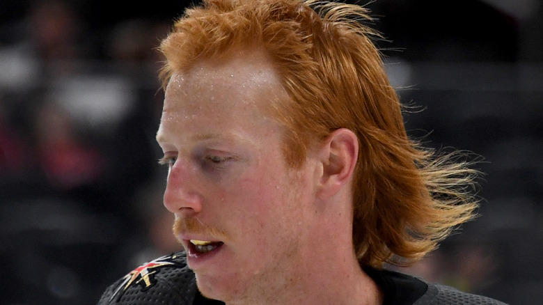 Hockey player Cody Eakin shows off his red mullet