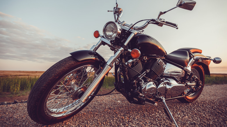 motorcycle illuminated by golden hour