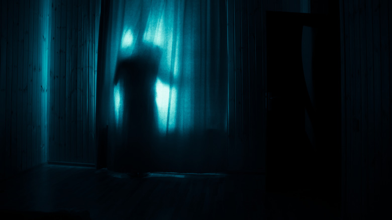 Spooky looming person