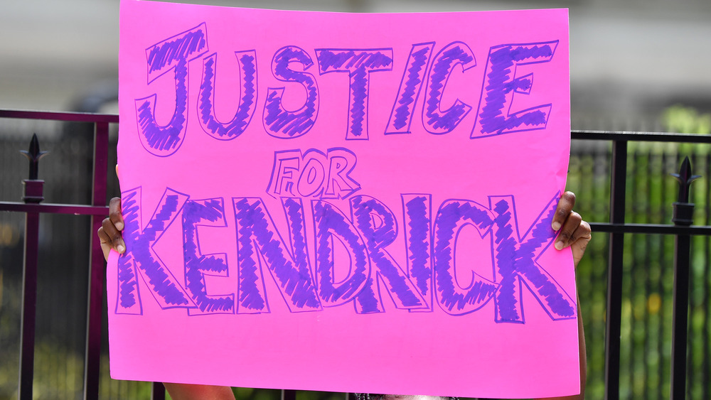 Protest sign reading Justice for Kendrick