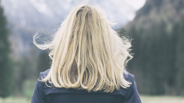 Blond woman mountains