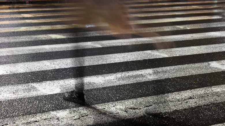 disappearing girl on crosswalk