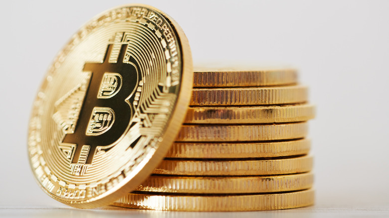 unbiased news Bitcoin coins white background