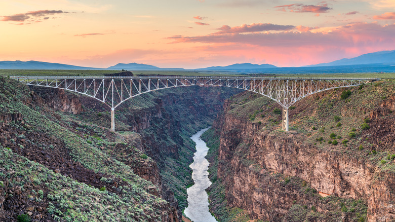 Bridge over canyon at sunset