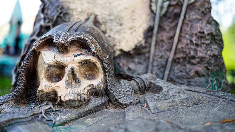 Decorative skull next to an ax