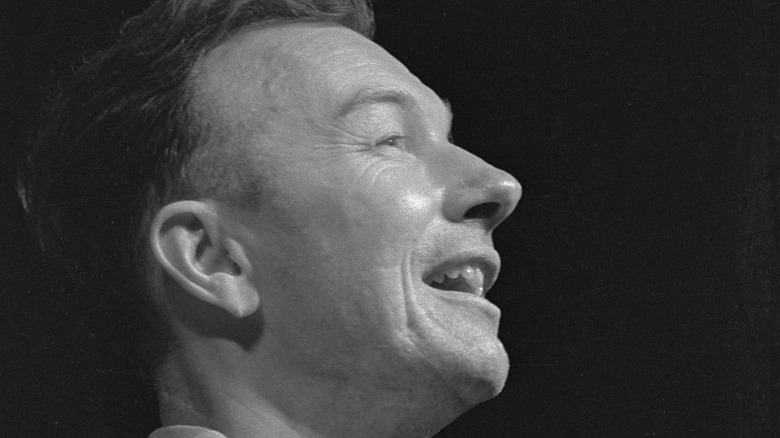 Pete Seeger with mouth in open smile