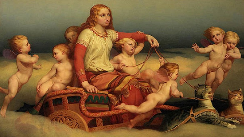 A woman, angels and a cat riding chariot chariot