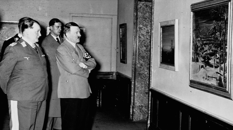 Hitler examining landscape painting