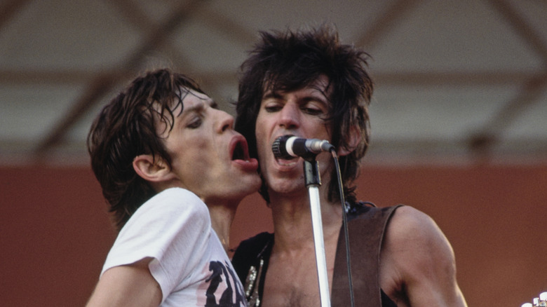 Mick Jagger and Keith Richards sharing a microphone