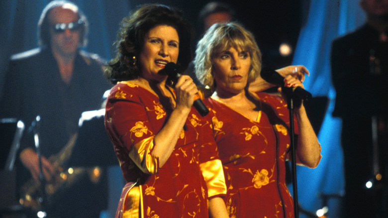 Phyllis Allbut and Peggy Santiglia performing side by side during an Angels concert in 2000