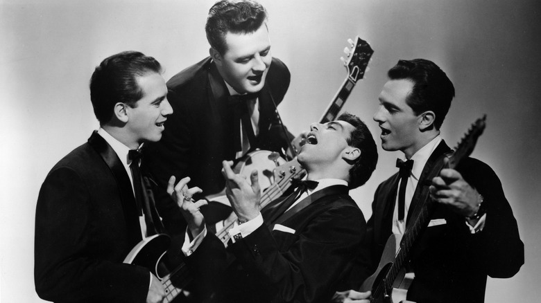 The Four Seasons playing instruments in publicity photo