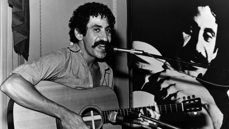 Jim Croce sat singing and playing guitar
