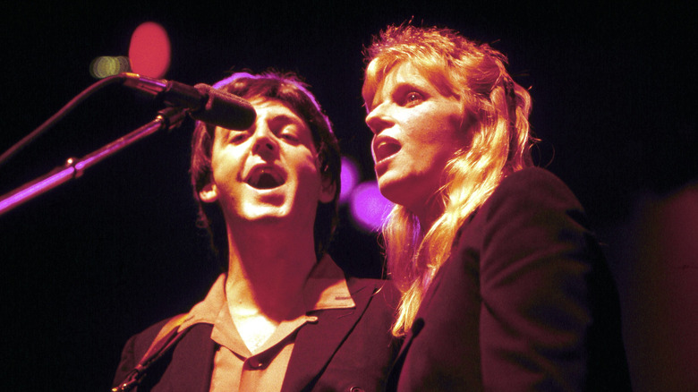 Linda and Paul McCartney singing together on stage