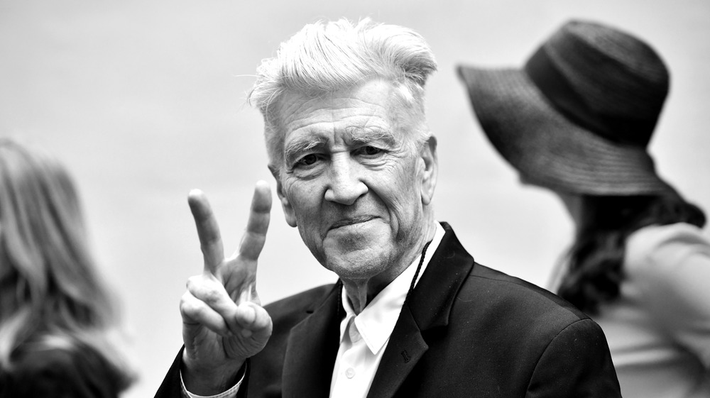 David Lynch giving peace sign