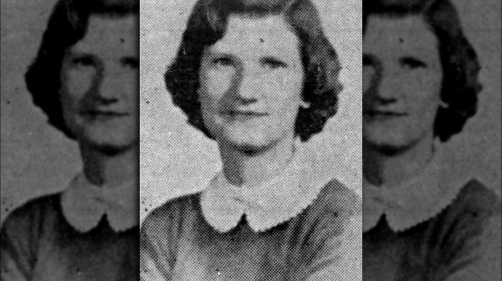 Elise Mae Roane smirking