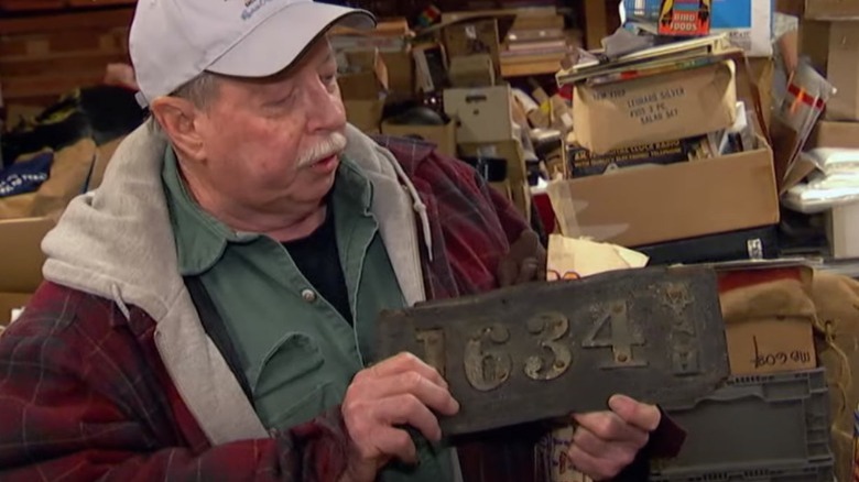 american pickers leather license plate