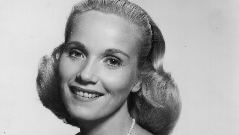 Young Eva Marie Saint grinning