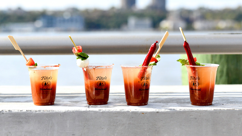  four Bloody Marys on bar