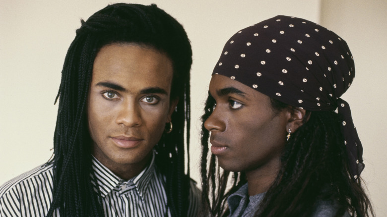 Milli Vanilli with dreadlocks staring together
