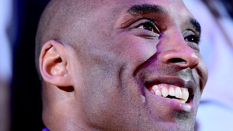 Kobe Bryant looking up smiling