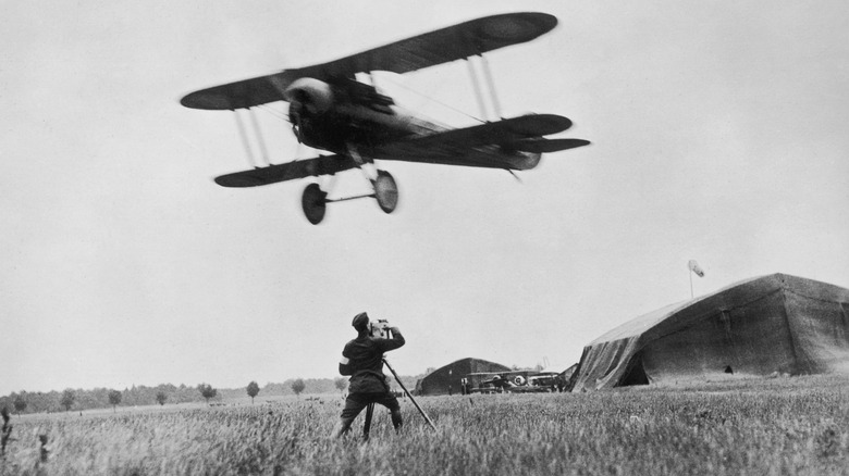 Filming a biplane in flight