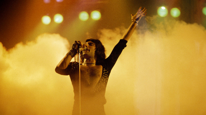 Freddie Mercury performing