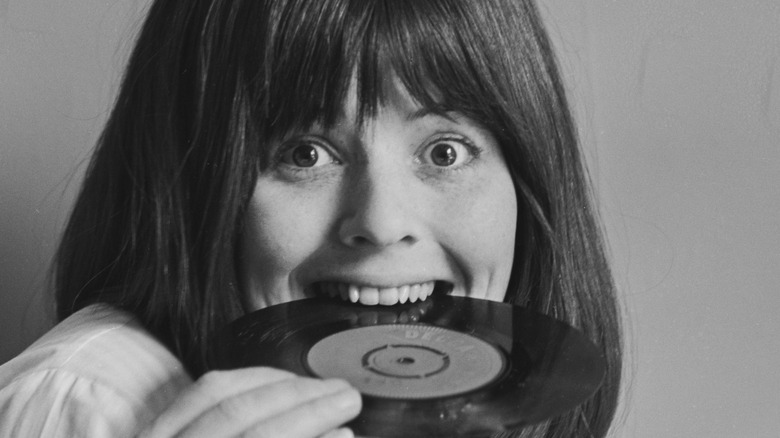 Maureen Cleave bites into 7-inch record