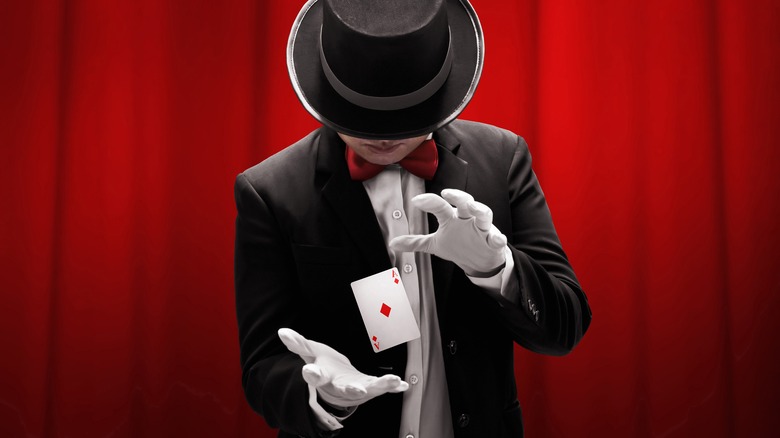 Magician doing card trick