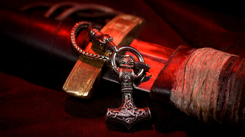 Thor's hammer pendant attached to sword