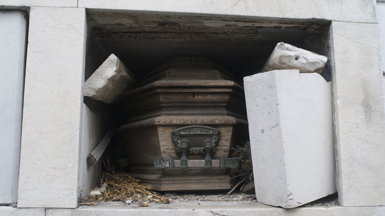 Coffin resting in cubby