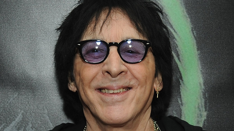 peter criss wearing sunglasses, smiling