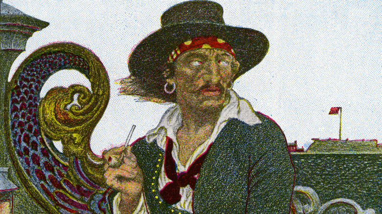 Pirate with earring smokes pipe