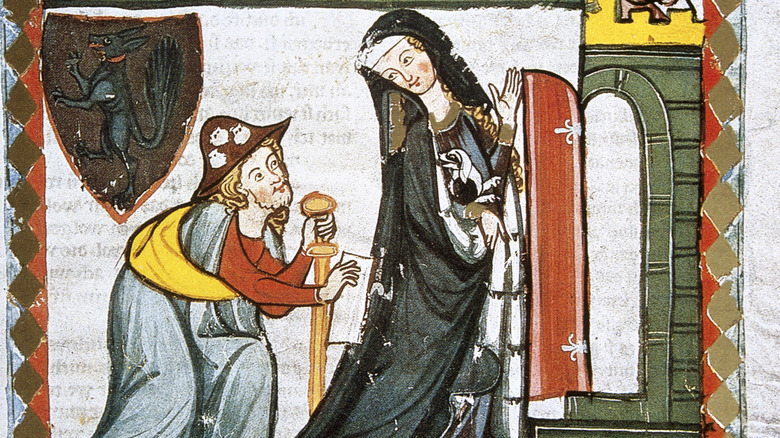 Medieval illustration showing pilgrim in broad hat and woman