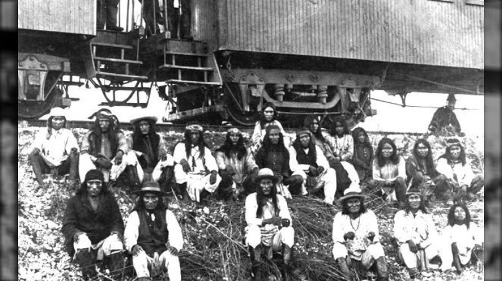 Band of Apache Indian prisoners at rest stop 