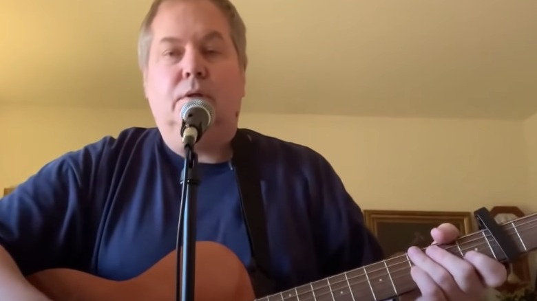 John Hinckley Jr. playing guitar