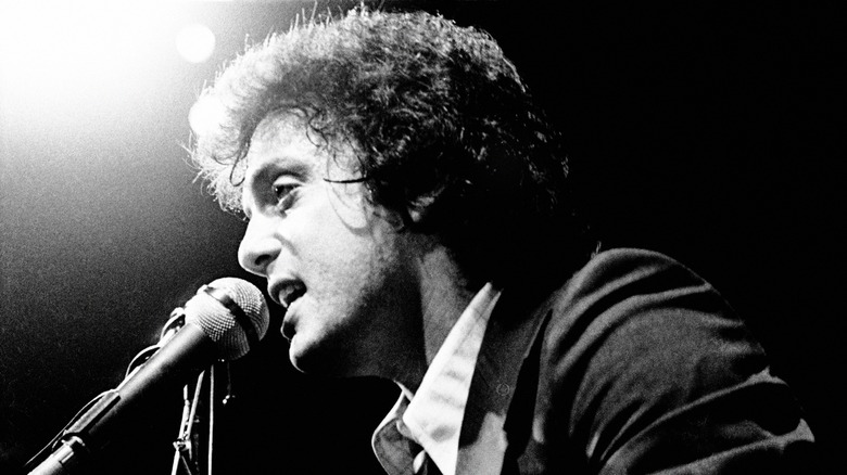 Billy Joel singing microphone long hair