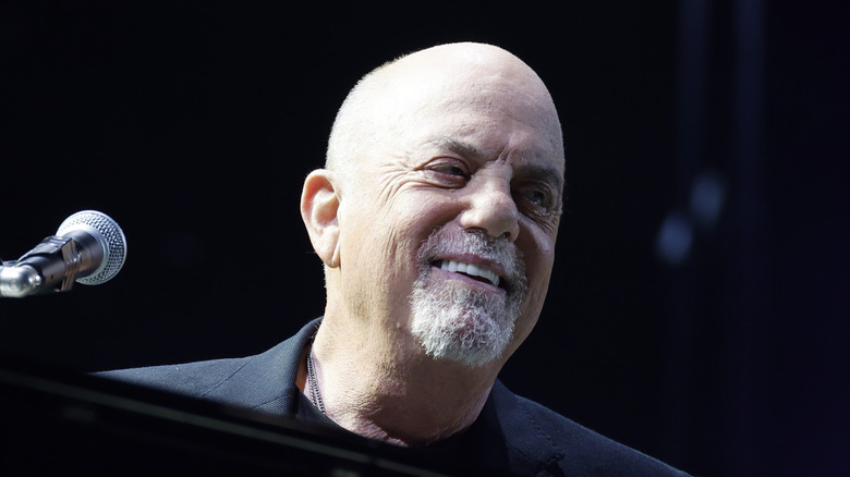 Billy Joel smiling microphone