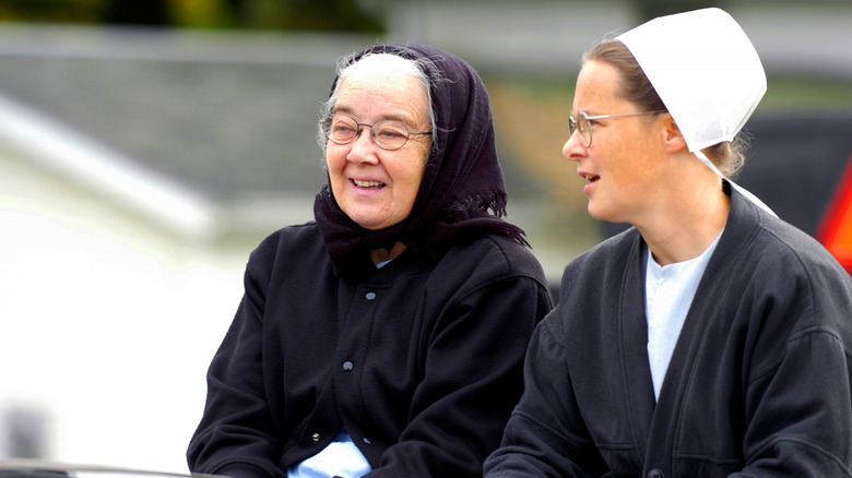 Two Amish women talking