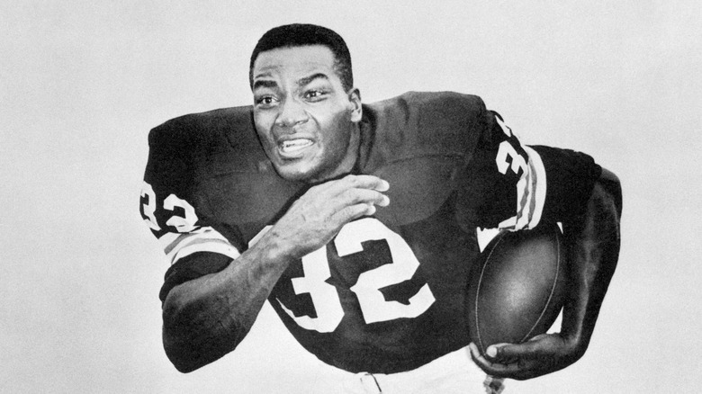 Jim Brown running with football
