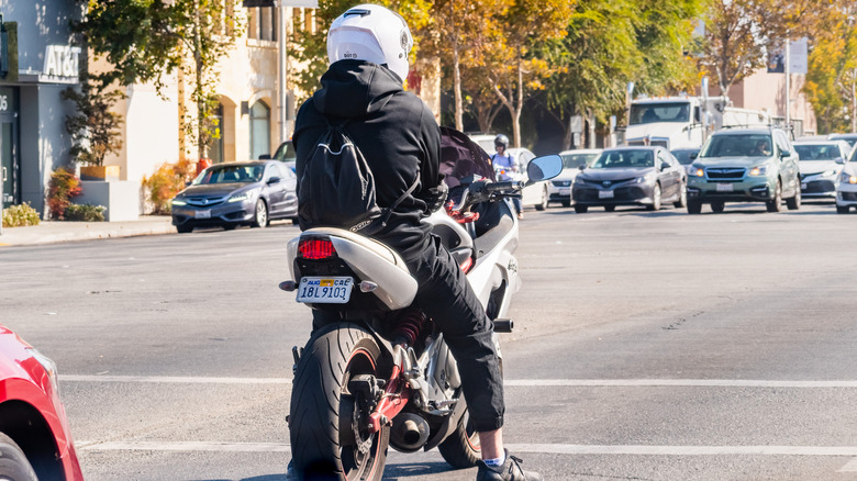Motorcyclist waiting at red light