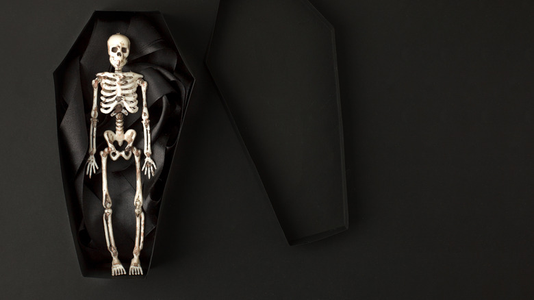 skeleton in coffin