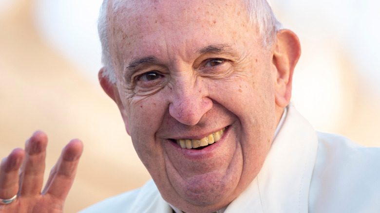 pope francis smiling and waving