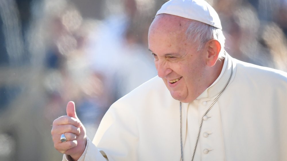 Pope Francis gives a thumbs-up