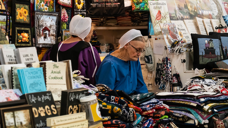 amish women selling goods