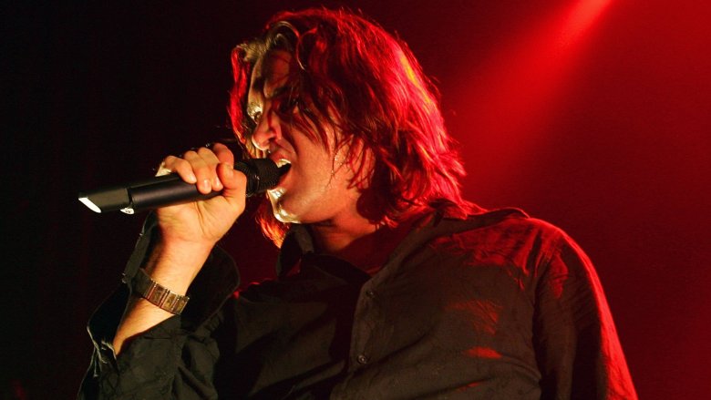 scott stapp singing mic on stage