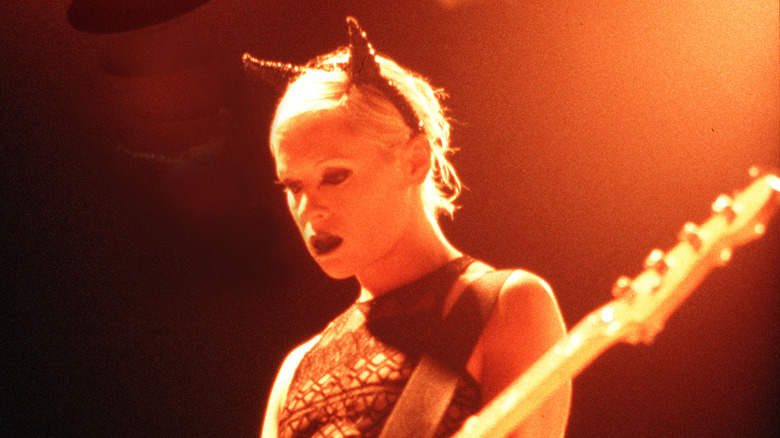 D'arcy Wretzky playing bass onstage