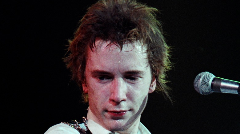 Johnny Rotten sneering