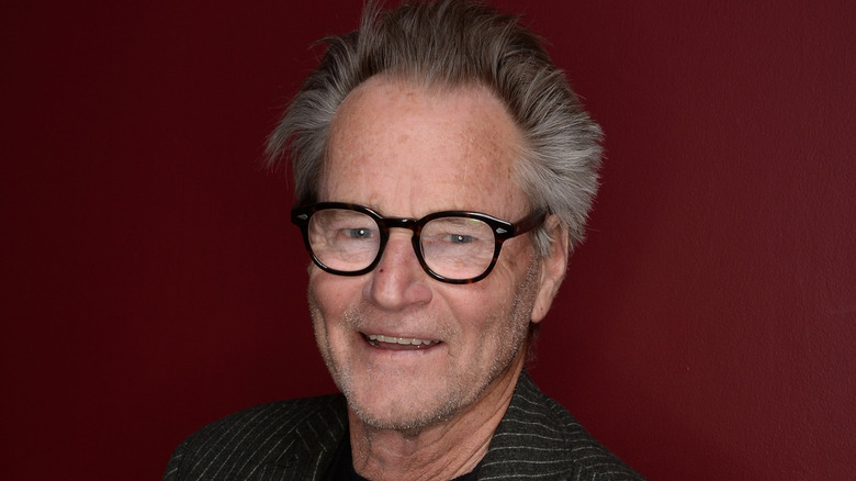 Sam Shepard wearing glasses