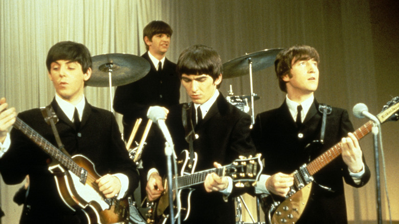 Beatles suits instruments on stage