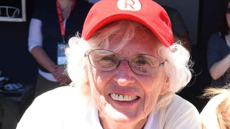Shirley "Hustle" Burkovich posing for a photo